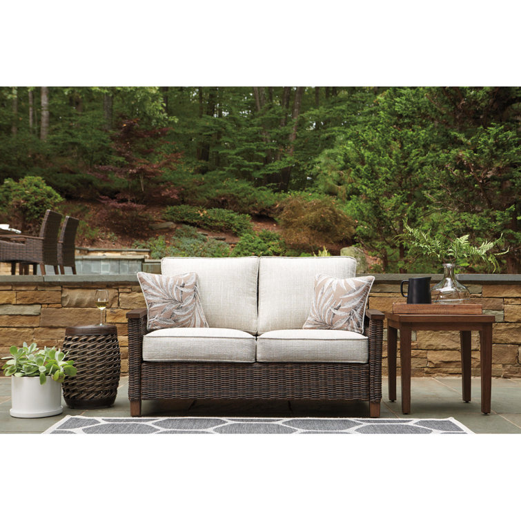 Highland Dunes Estill 58.5'' Wide Outdoor Wicker Loveseat with Cushions